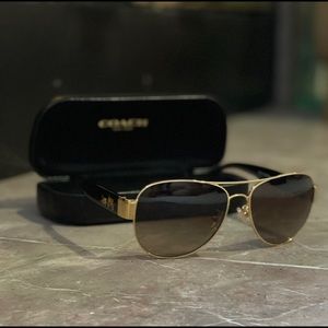 Coach gold metal and back women’s sunglasses